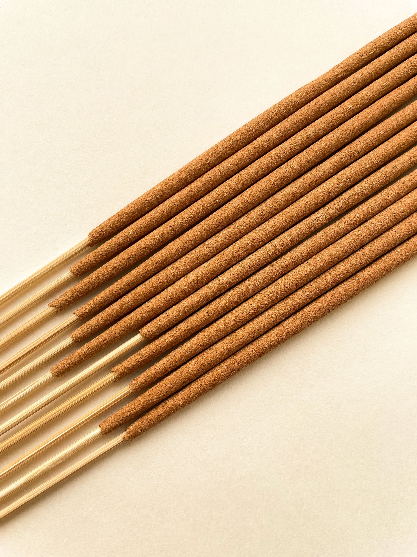 Natural incense sticks. Wood powder visible.
